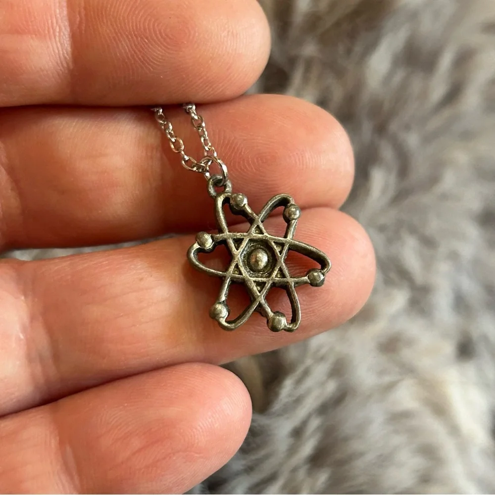 Vintage CLIFT pewter atomic pendant on chain necklace